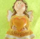 Engel Putte als Kantenhocker lustiges Motiv mit Herz gelb 12 cm hoch Kunststein
